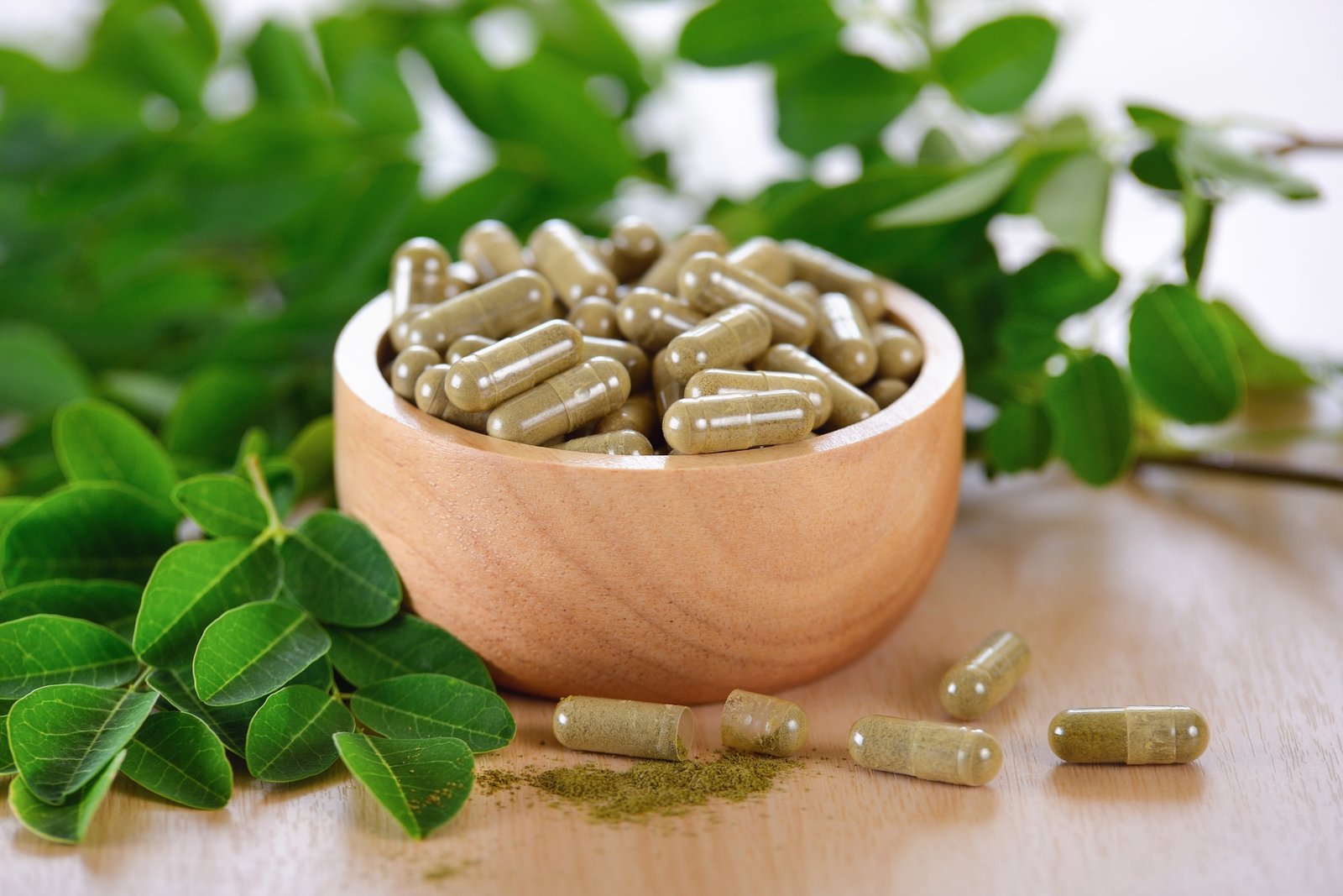 Moringa leaves and capsules (Herbs for health)